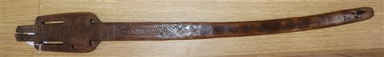 A Polynesian or Aboriginal carved wooden staff or spear thrower length 87cm